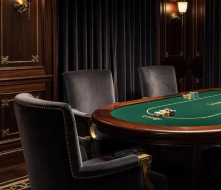 Private poker room with custom tables, ambient lighting, and intimate dining settings.
